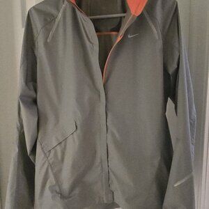 Nike Storm-Fit Women Windbreaker Jacket Reflective Zip Pockets